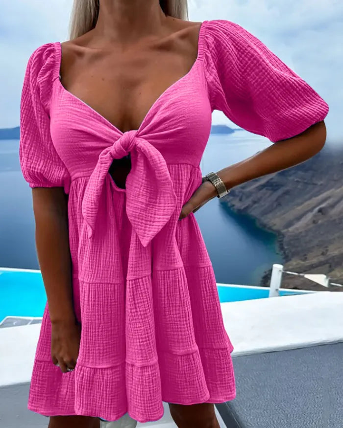 Robe à manches courtes col V avec nœud - Projet Paris - Tendance et chic